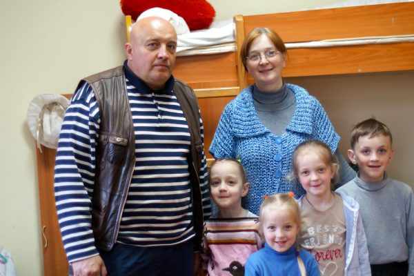 Jurij Radczenko, his wife Natalia and four children, have been sharing one room at a church shelter for the past nine months.